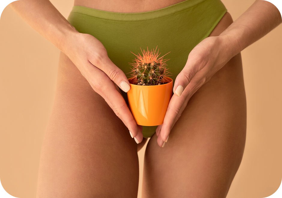 Woman holding cactus as metaphor for vaginitis symptoms.